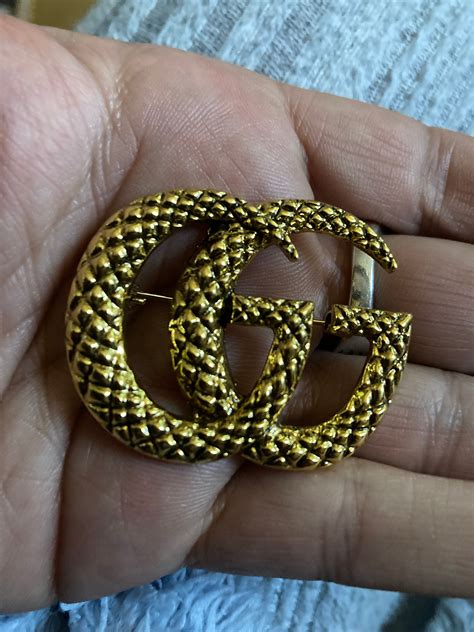 gucci brooch fake|Gucci brooch price.